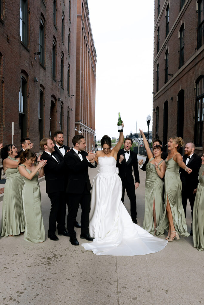 Bride and groom, having champagne with their friends
