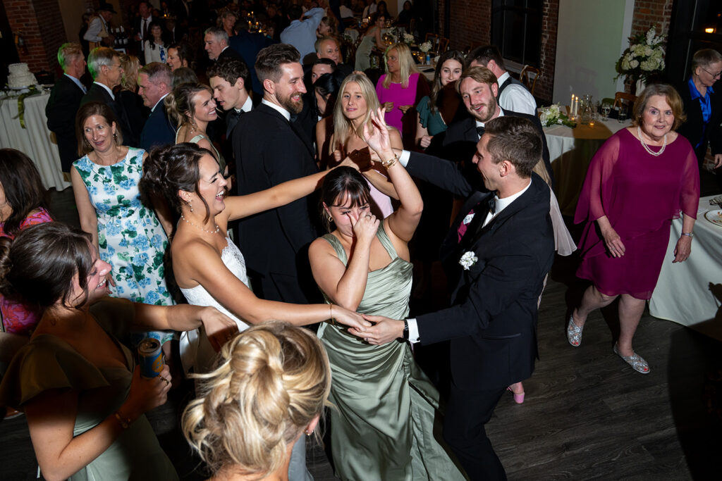 Wedding guests having the best time at the reception party