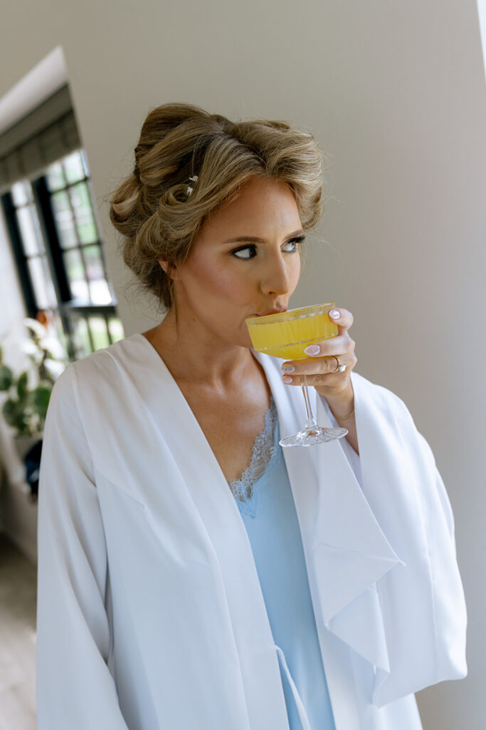 bride enjoying some mimosas