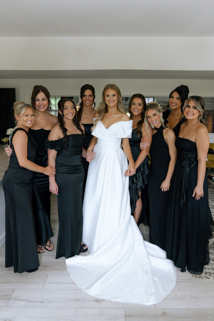 cute portrait of the bride and her bridesmaids before the ceremony