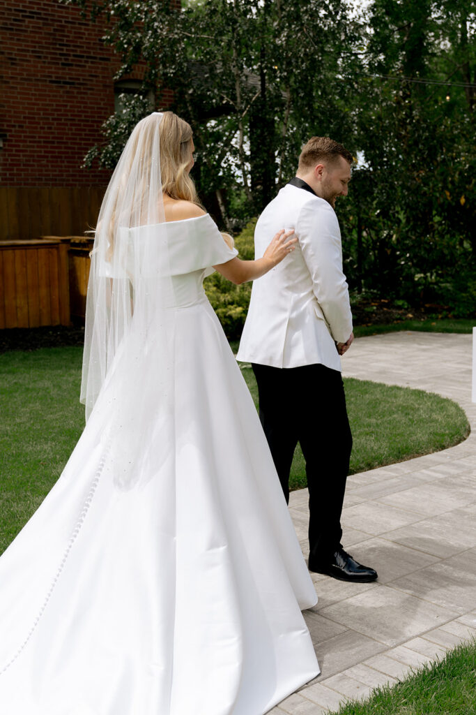 bride at her first look with the groom
