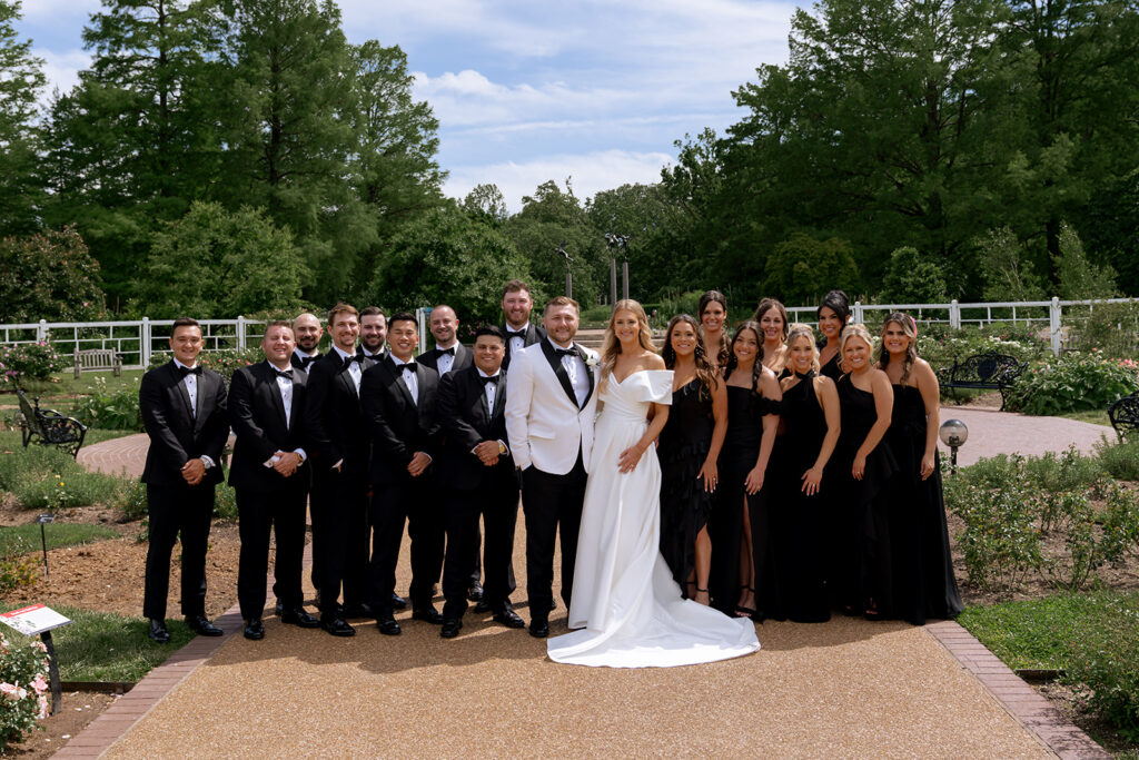 picture of the bride and groom with their bridal parties
