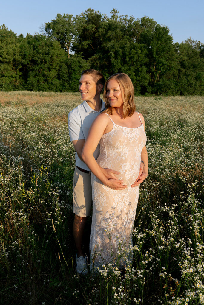 soon to be parents at their golden hour session