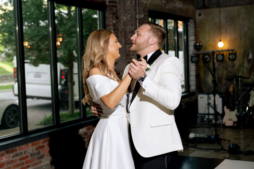 picture of the newlyweds smiling at each other