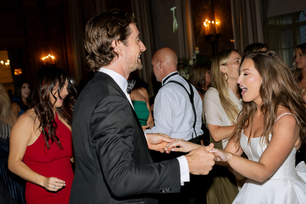Newly married couple dancing at their wedding reception party