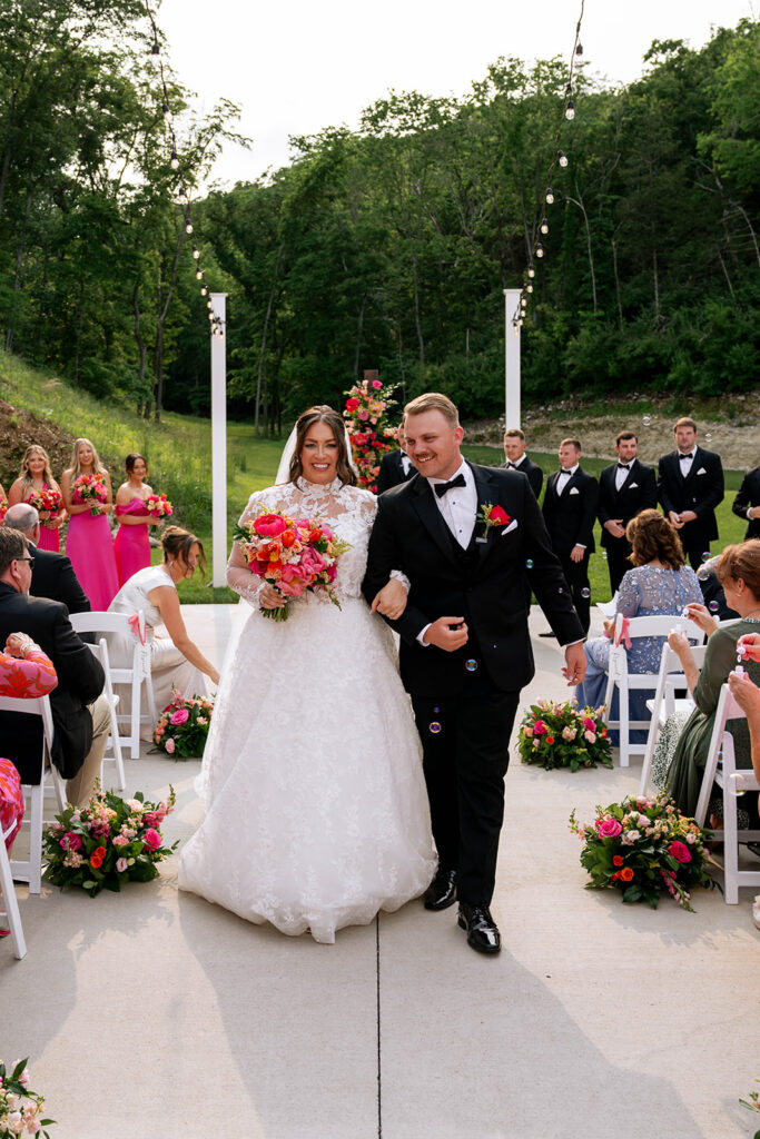 cute picture of the newlyweds heading to their wedding reception
