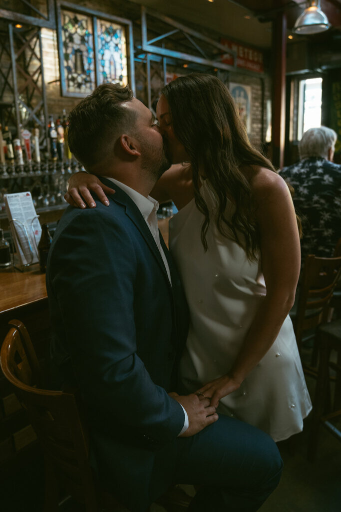 couple kissing during their photoshoot