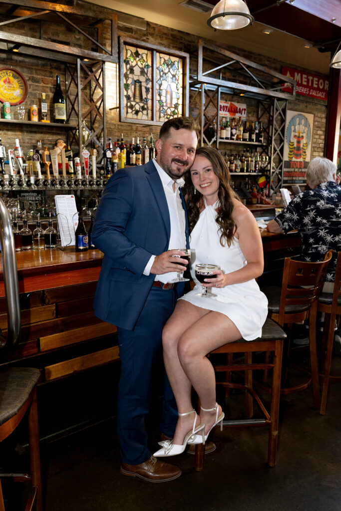 couple smiling at camera during their session