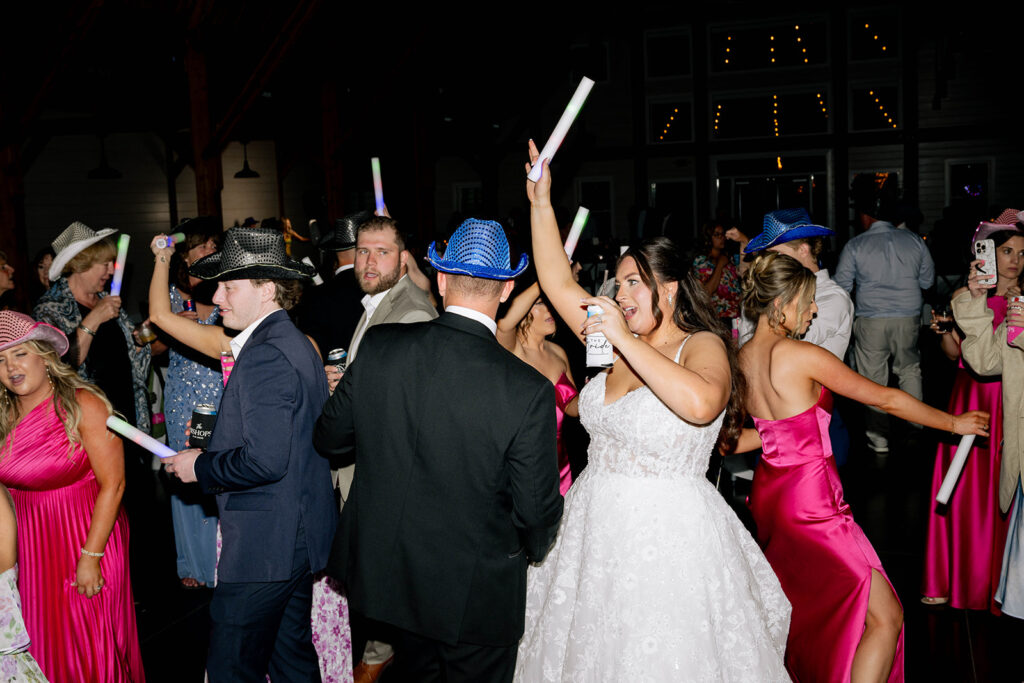 newlyweds at their fun wedding reception party