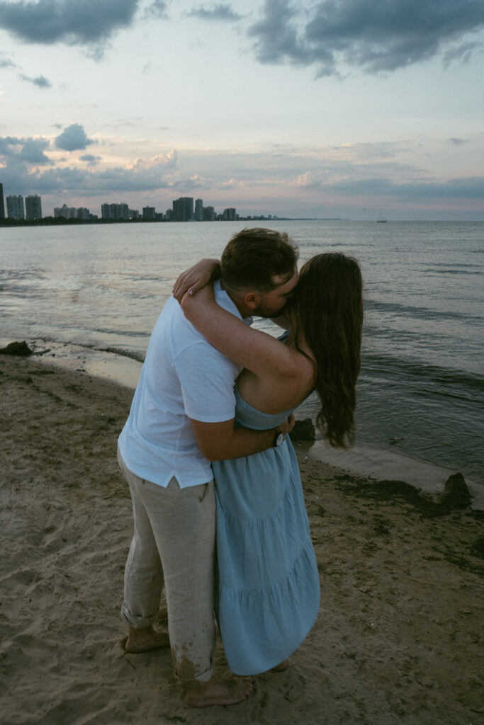 fiance kissing his fiance on the cheek