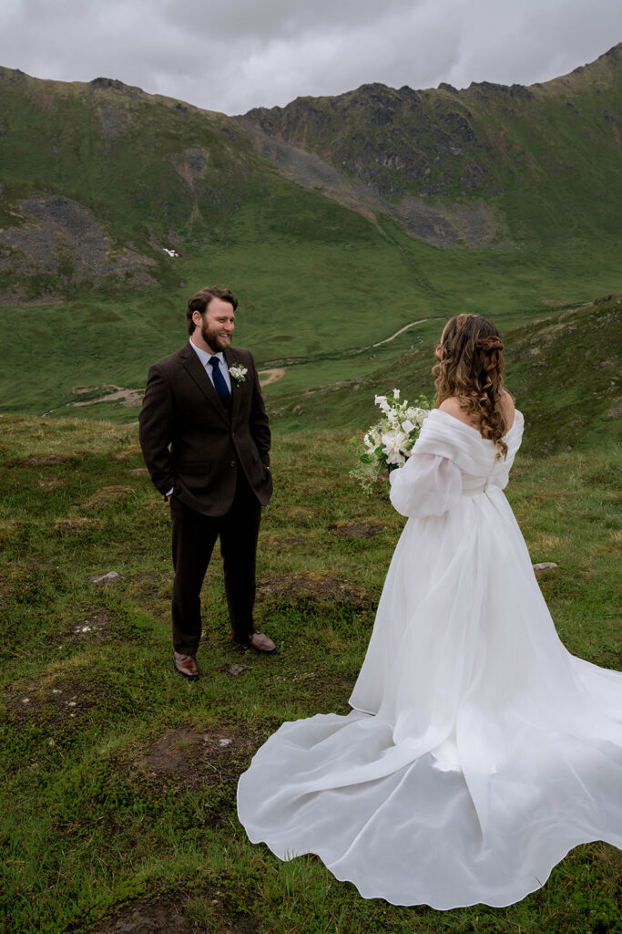 picture of the bride and groom smiling at each other
