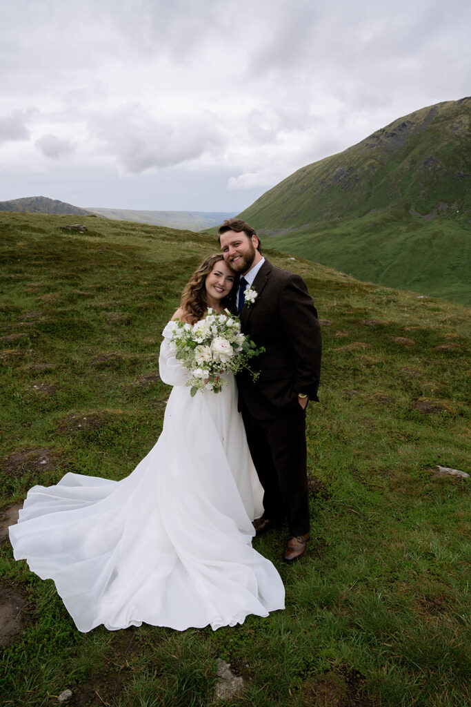 cute picture of the bride and groom hugging 
