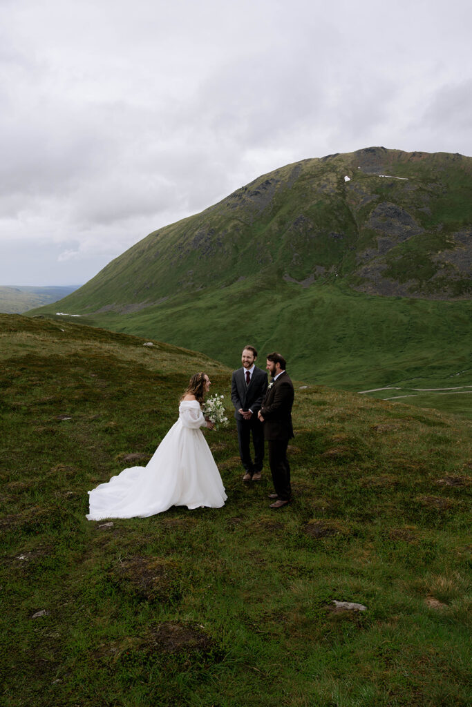 Bride and groom laughing with each other during their ceremony