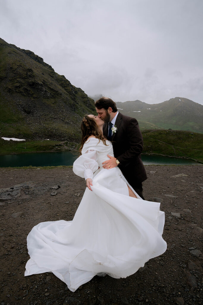 portrait of the newlyweds kissing 