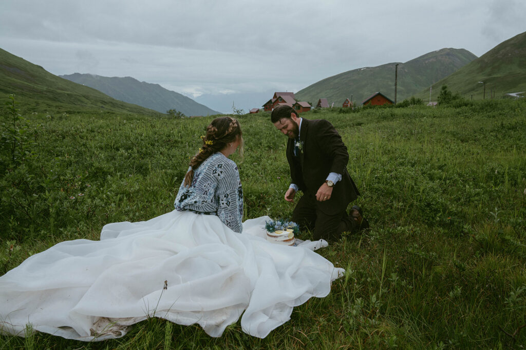 cute couple enjoying their wedding cake 