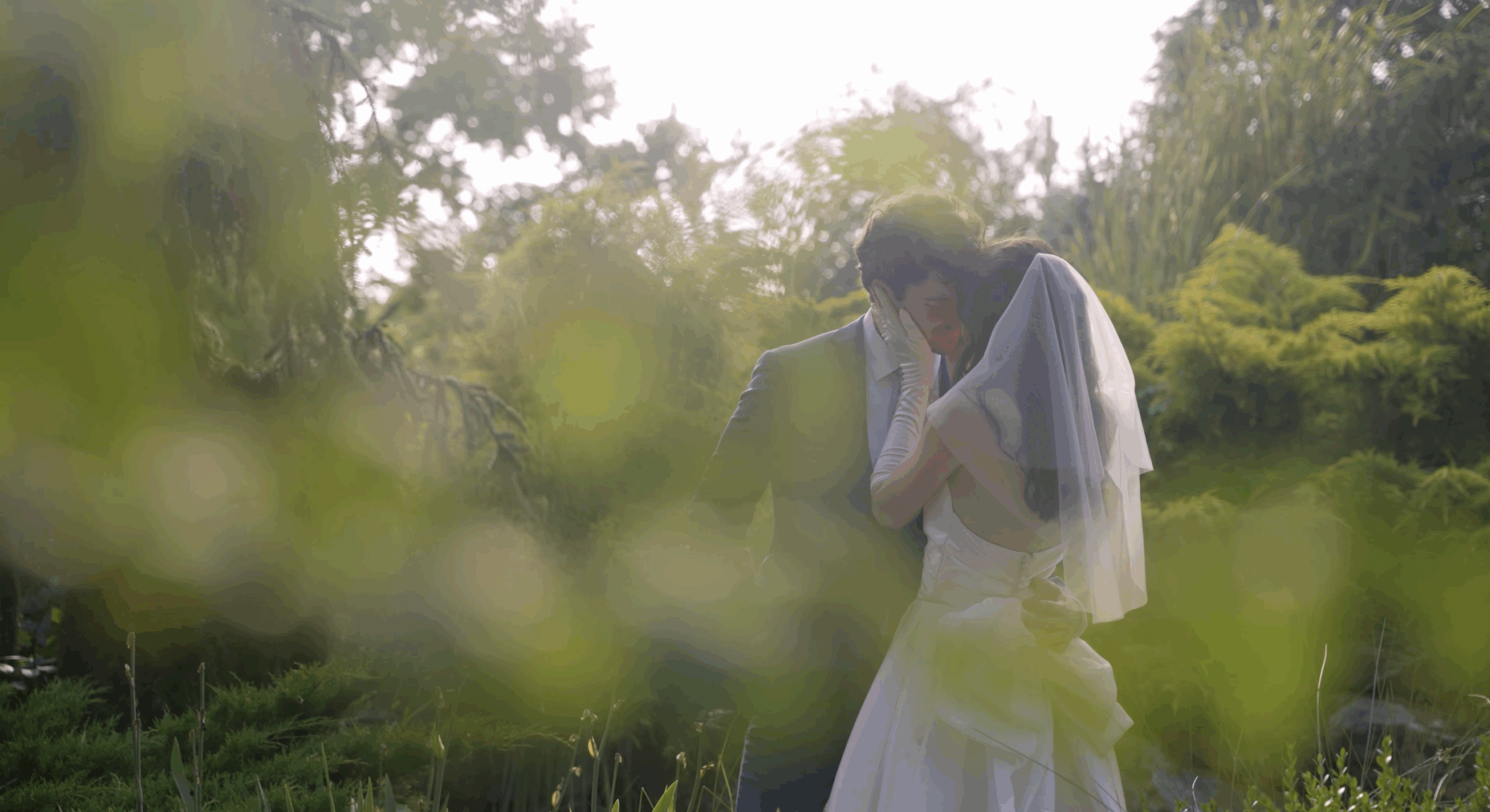cute picture of the bride and groom kissing