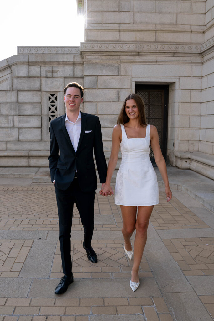 portrait of the couple holding hands during their session