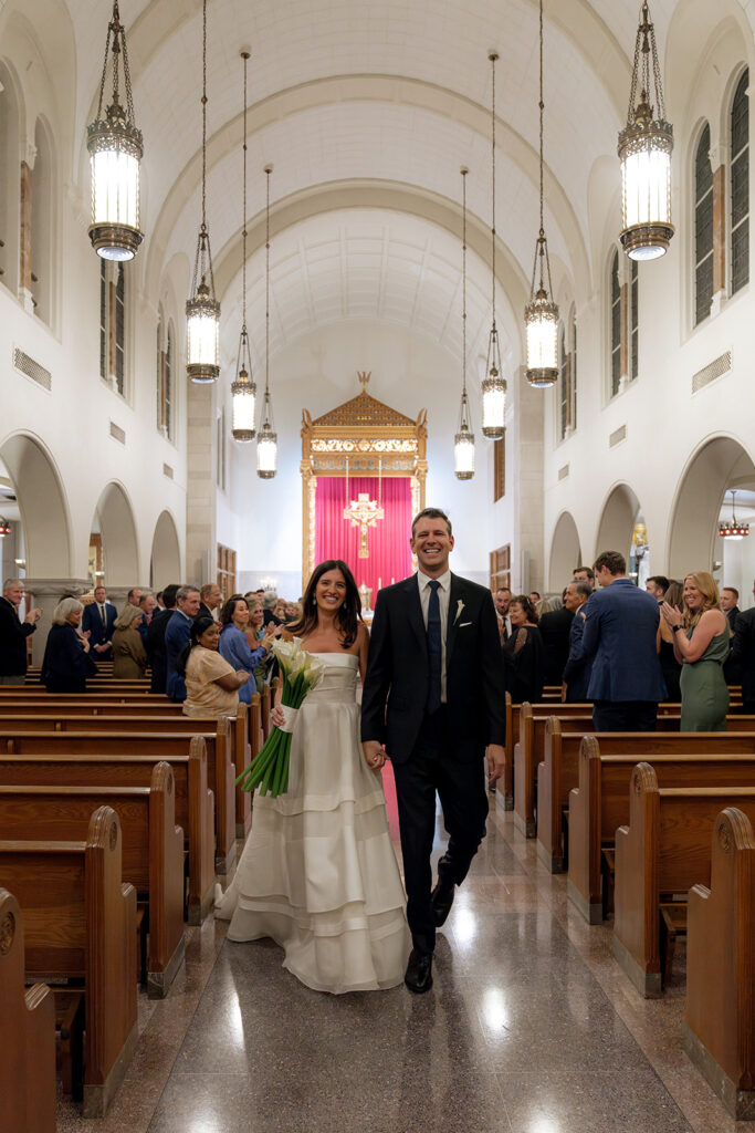 newlyweds heading to the wedding reception