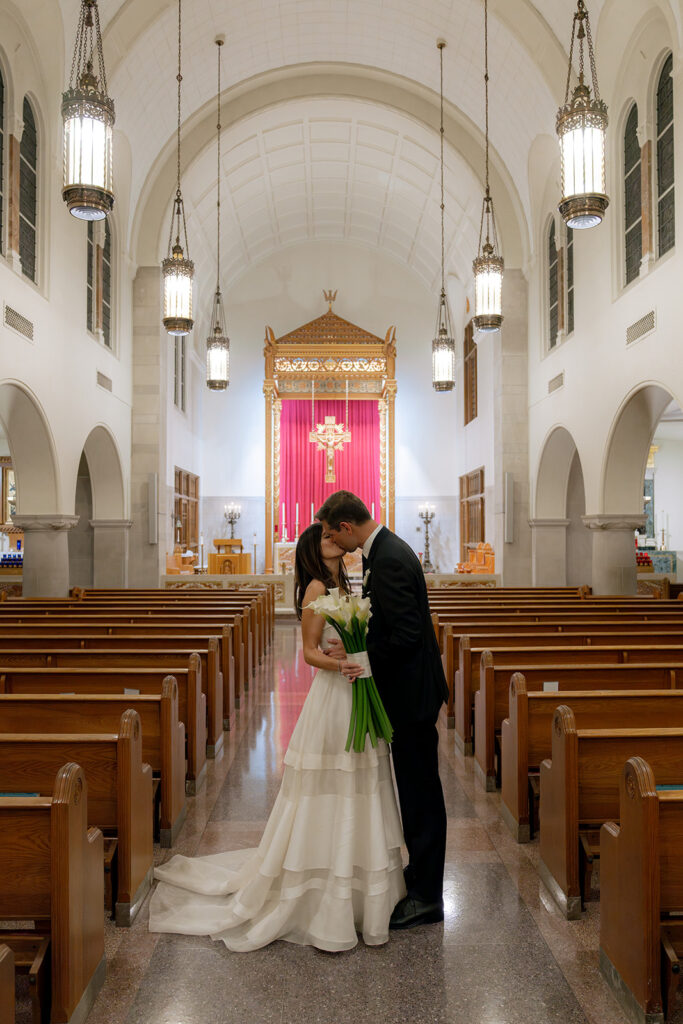 cute picture of the newlyweds kissing