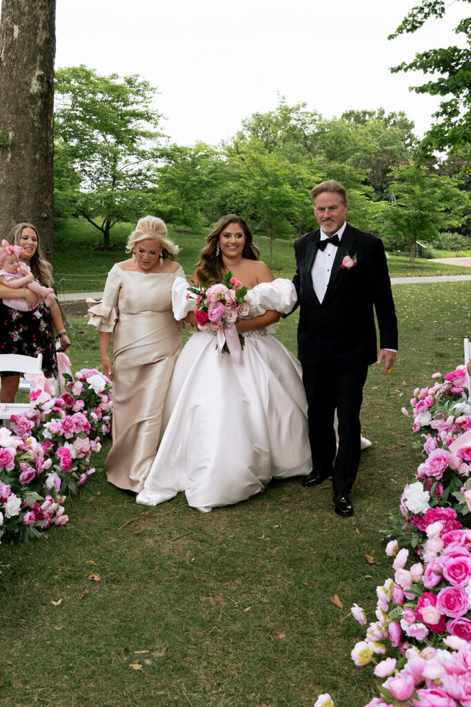 Stunning picture of the bride walking down the aisle