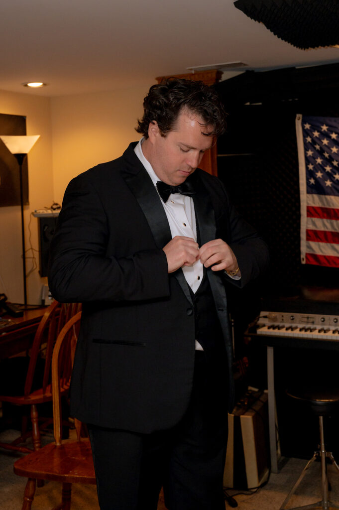 picture of the groom getting ready for his ceremony