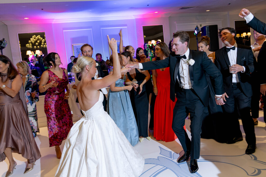 Newly married couple having the best time at their reception party