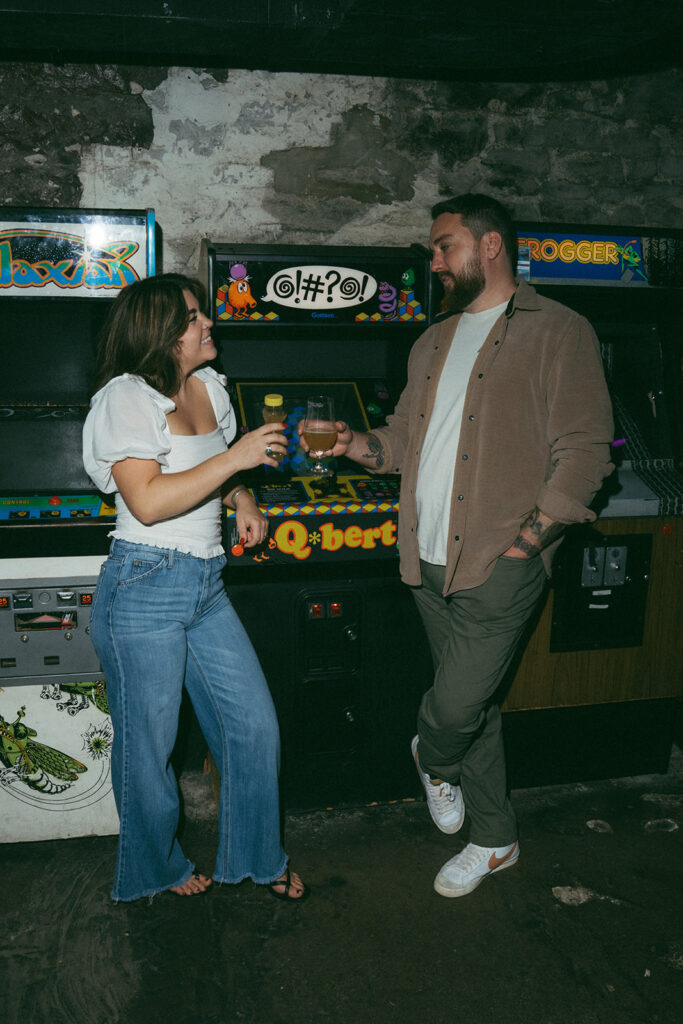 cute picture of the newly engaged couple smiling at each other