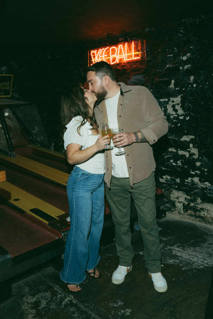 cute couple kissing during their photoshoot