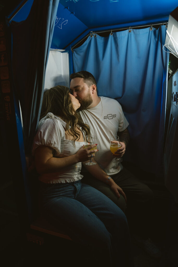 couple kissing during their engagement session in st. louis