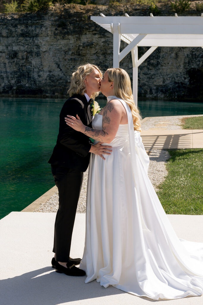 couple kissing during their first look