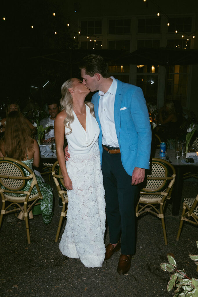 cute picture of the bride and groom kissing