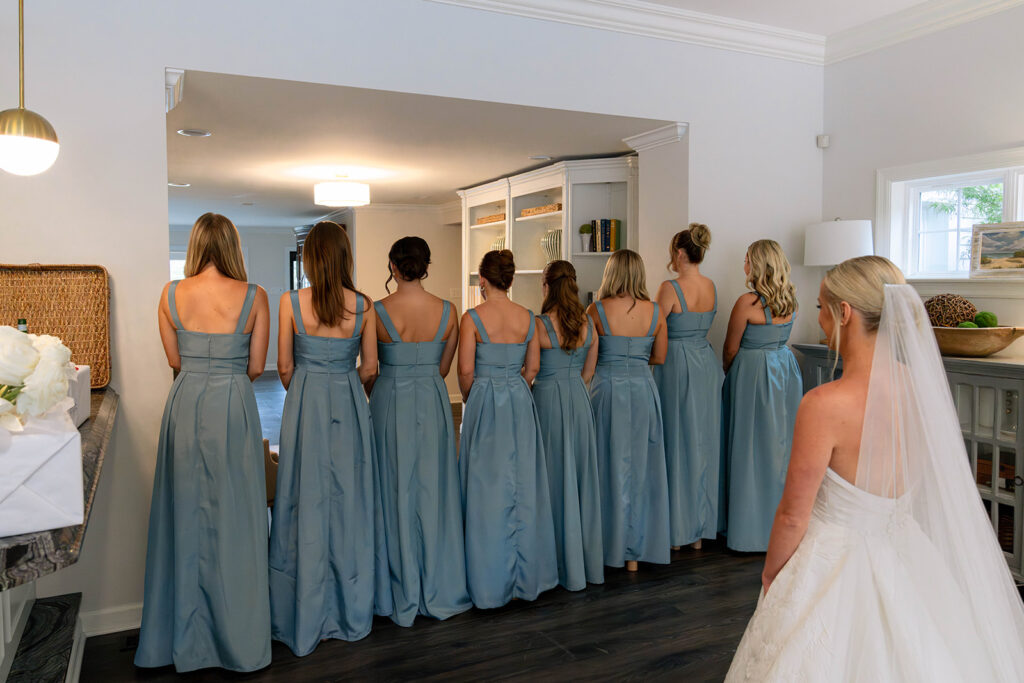 first look of the bride and her bridesmaids