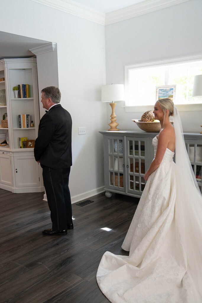 first look of the bride and her dad