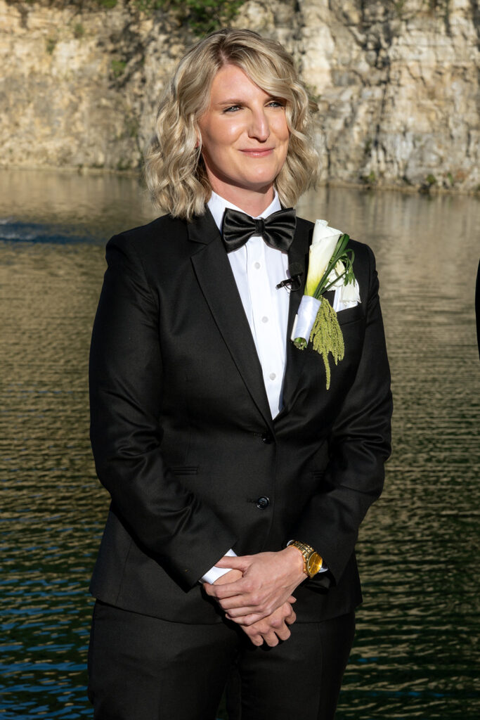 bride watching the bride walk down the aisle
