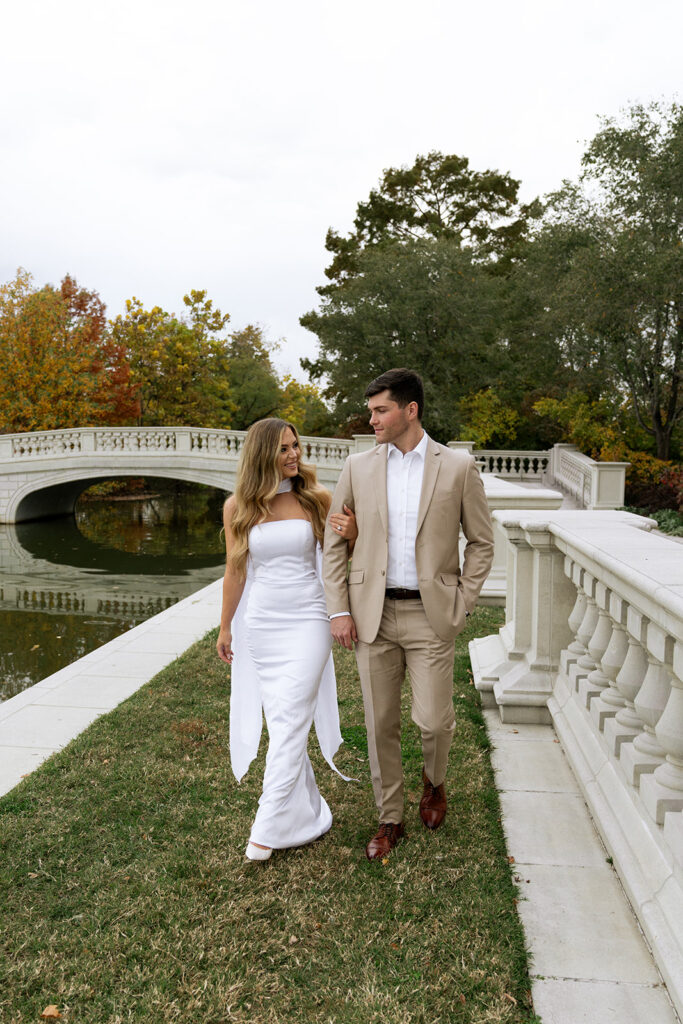 couple holding hands during their elegant couple portraits