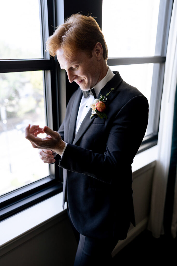 groom before his first look with the bride