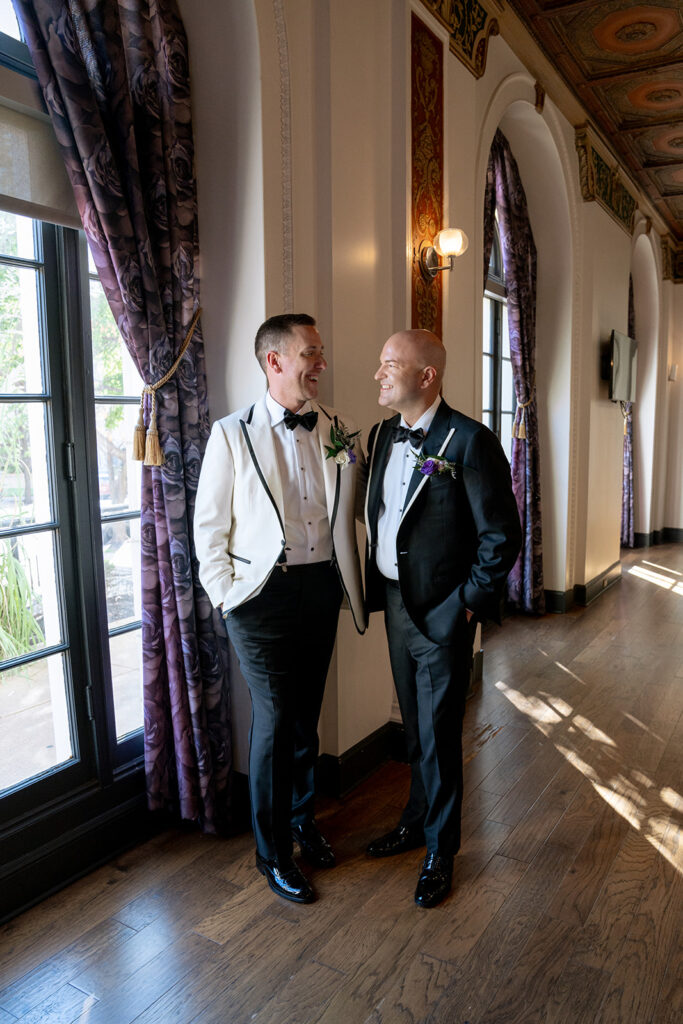 couple smiling at each other during their bridal portraits