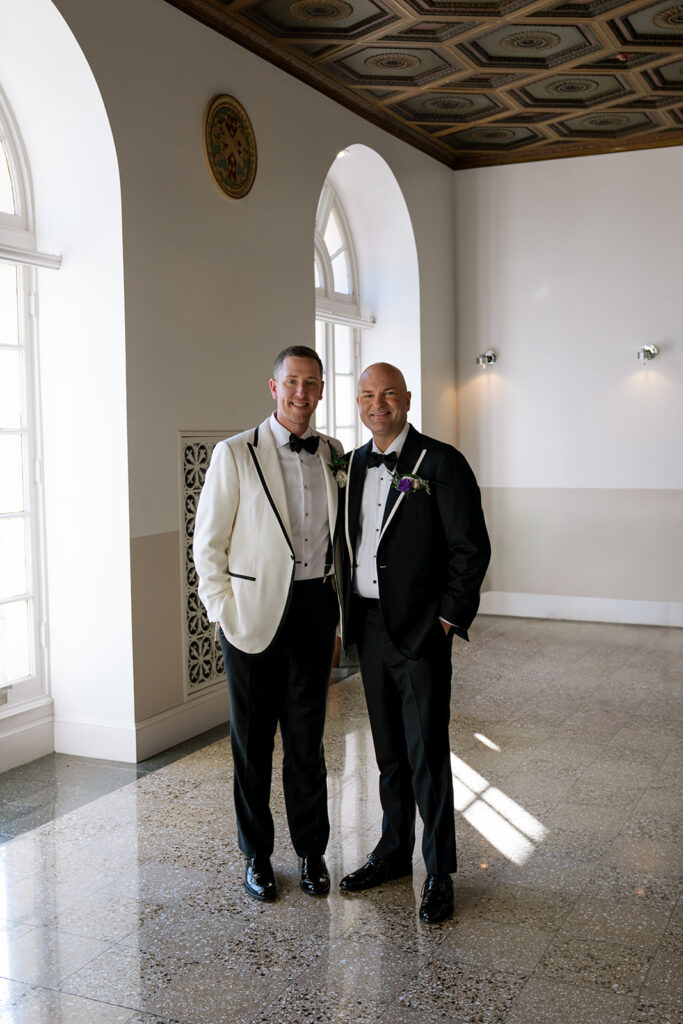 cute picture of the couple smiling at the camera during their bridal portraits