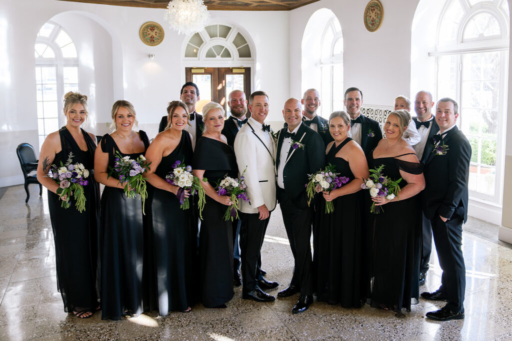 cute picture of the couple with their bridal party