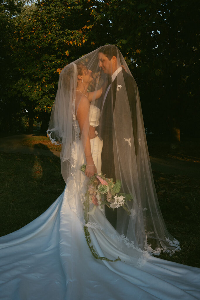 cute picture of the bride and groom smiling at each other