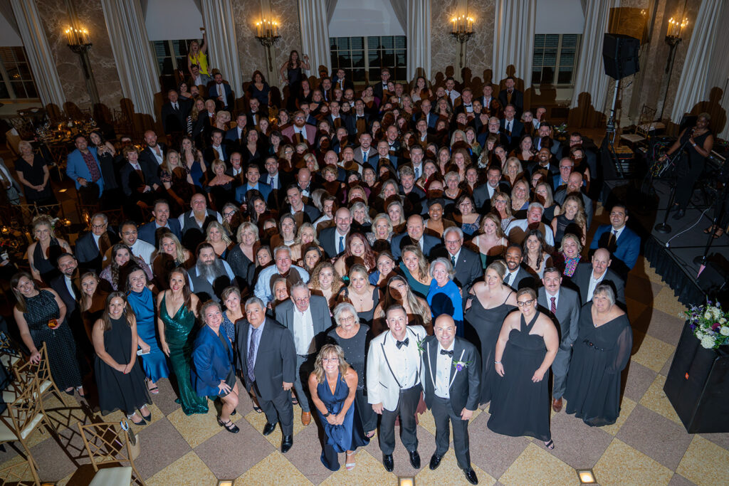 cute picture of the newlyweds and their wedding guests