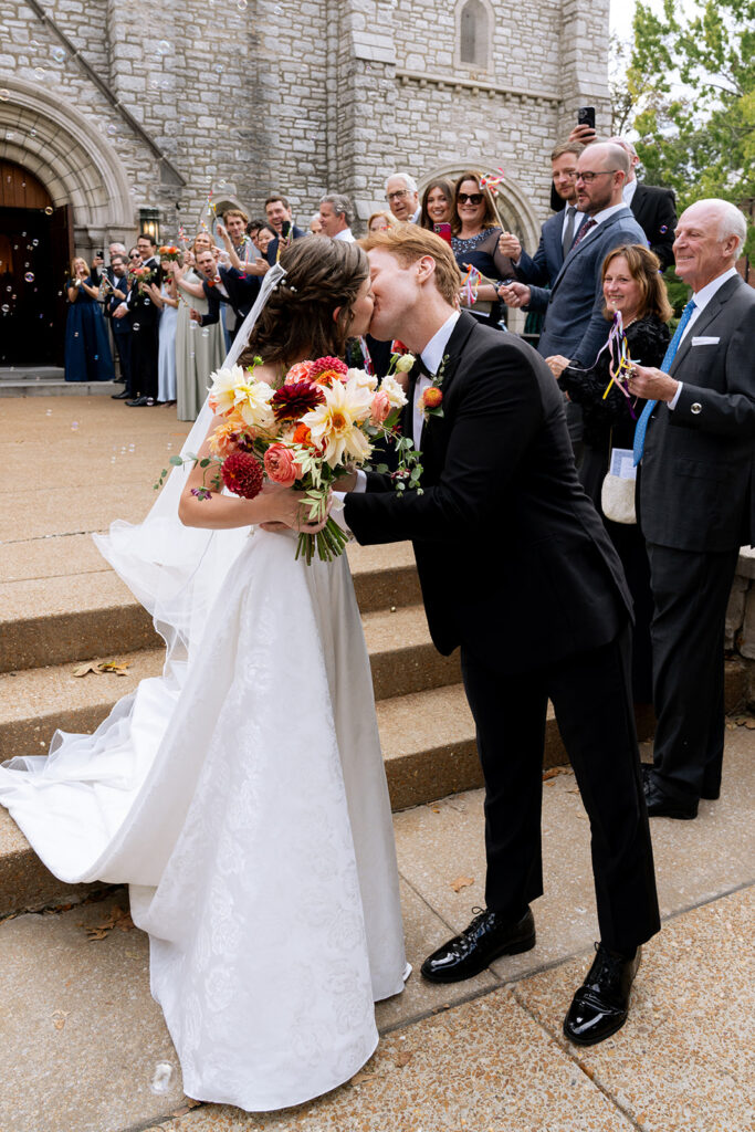 cute picture of the newlyweds kissing