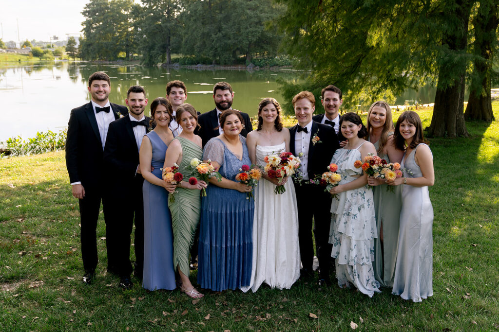 cute picture of the bride and groom with their bridal parties