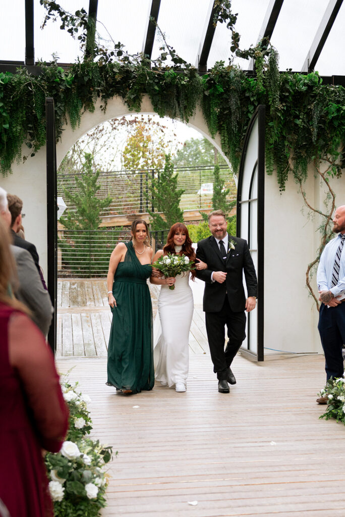cute picture of the bride walking down the aisle 