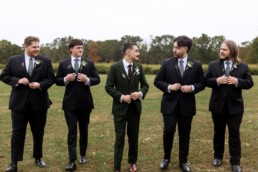 portrait of the groom and his groomsmen 