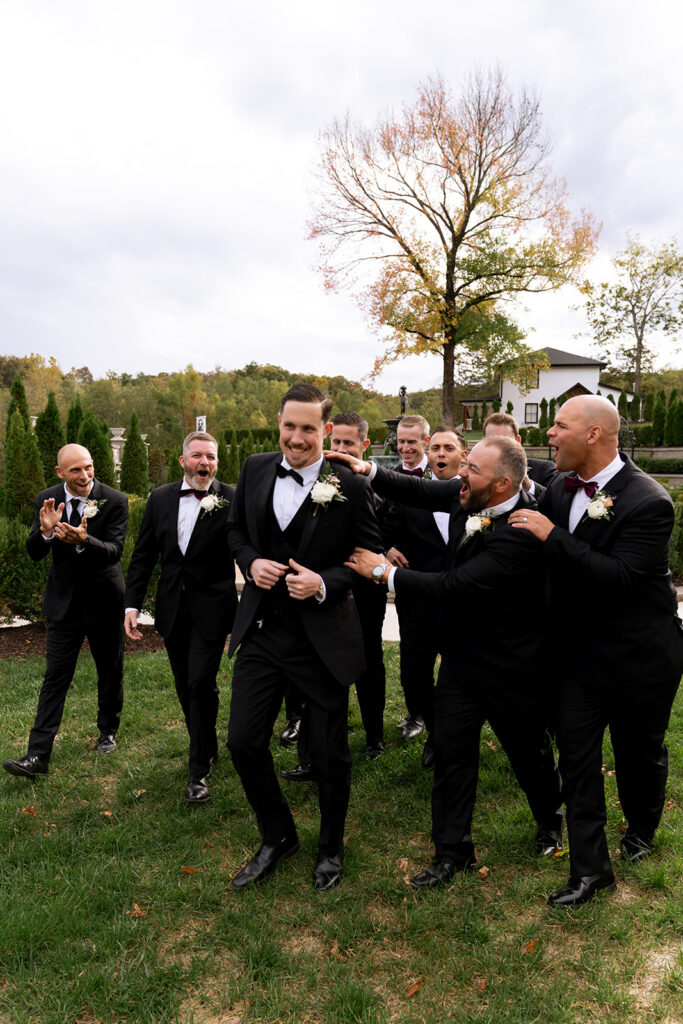 Playful picture of the groom and his friends