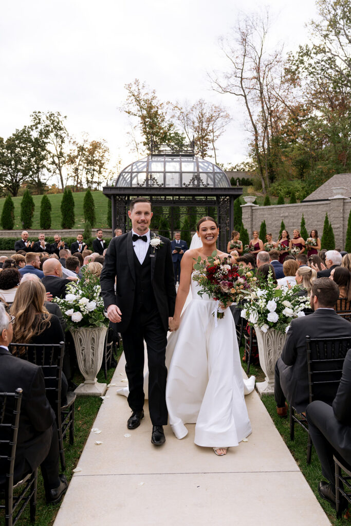 Newly married couple heading to their wedding reception