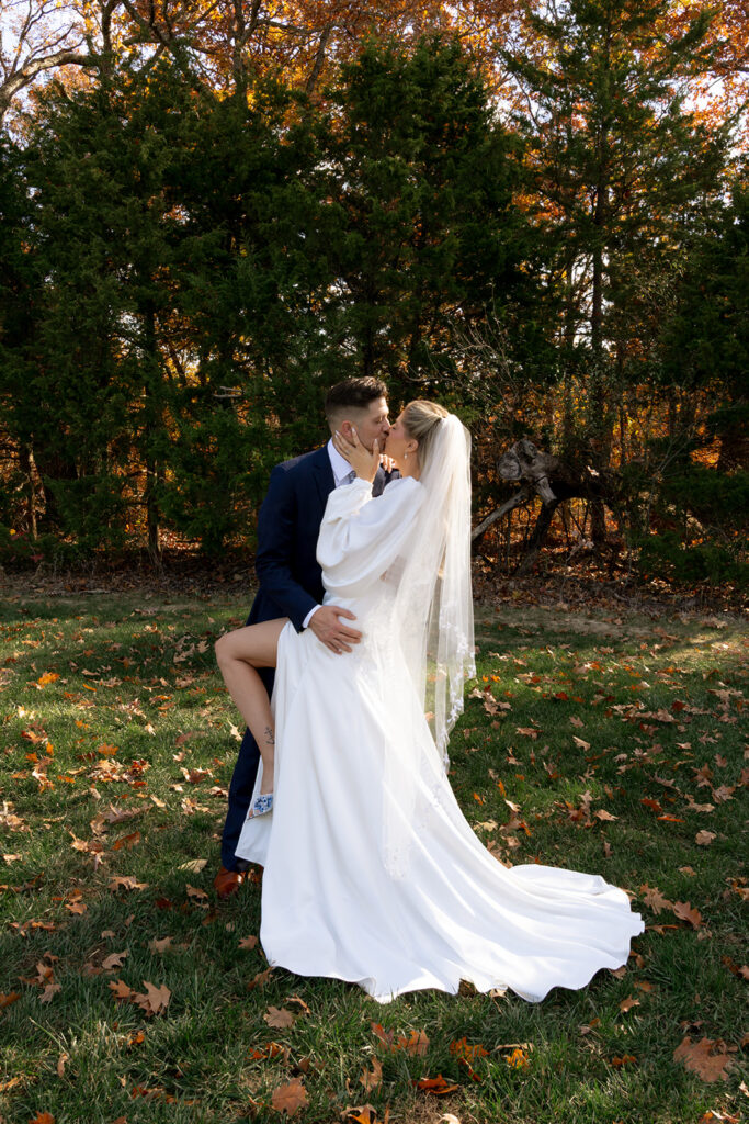 cute picture of the bride and groom kissing