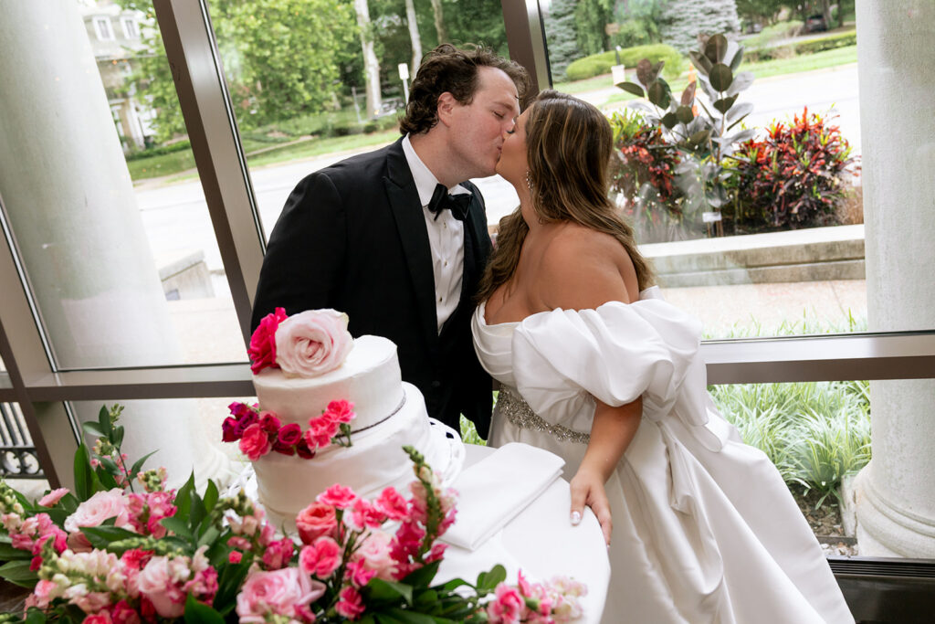 cute picture of the newlyweds kissing