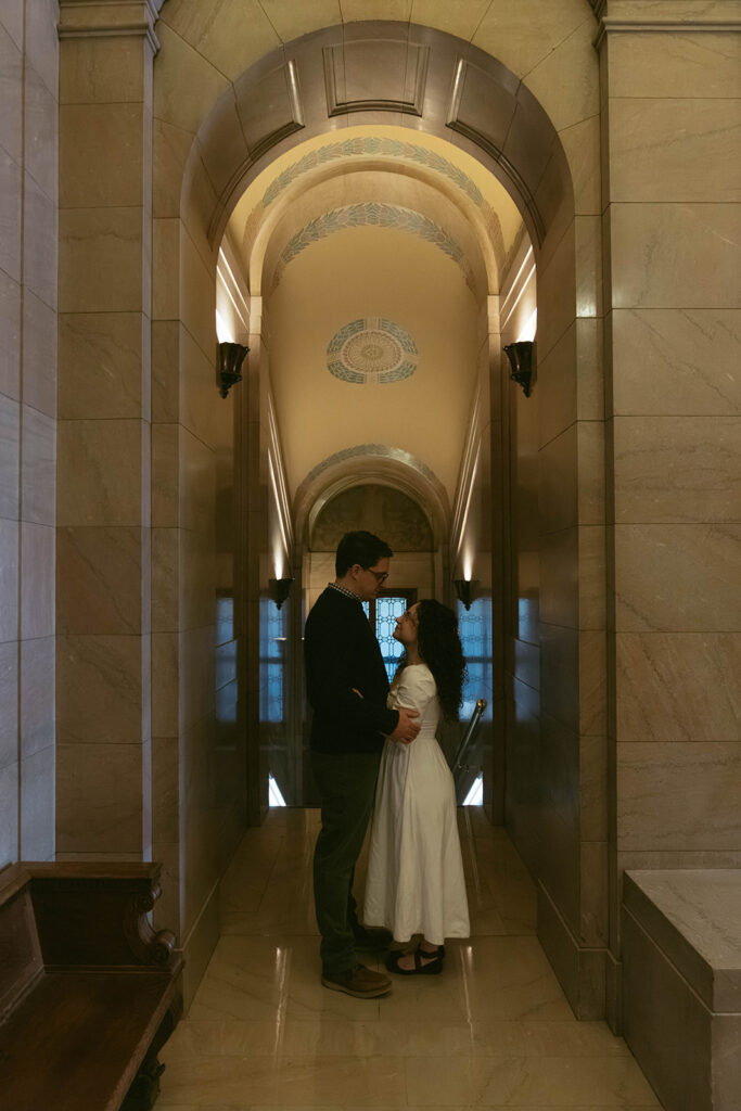 cute picture of the newly engaged couple kissing